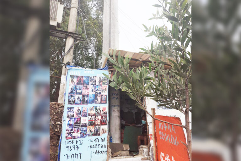 A shop surrounding utility post